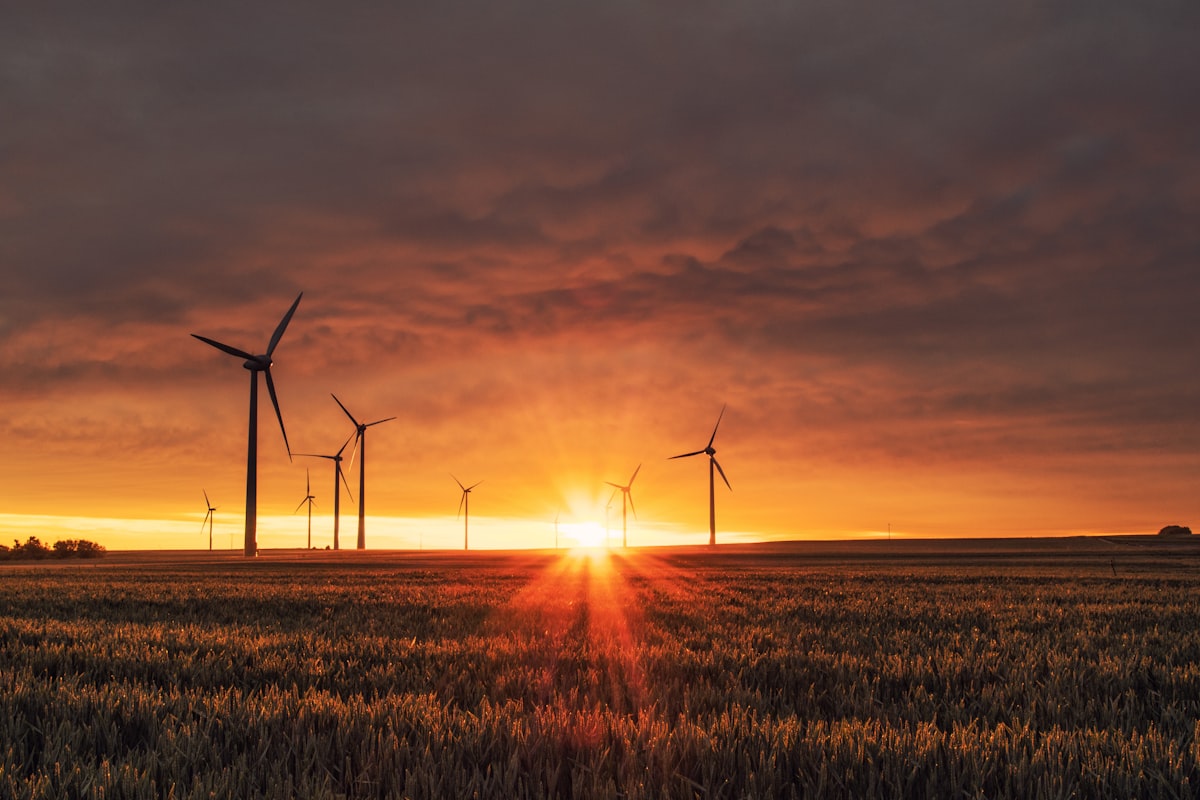 Wind turbines on a green hill of the Spanish central plateau